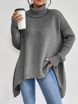 Women's Chunky-Knit Ribbed Oversized Turtleneck Sweater in Stone Gray, on model