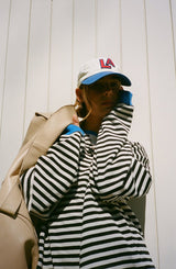 Women's Striped Oversized Sweater in Blue & Black, on model
