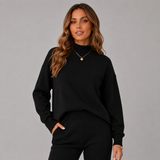 Women's Relaxed Ribbed Turtleneck Sweater in Black, on model