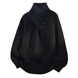 Women's Ribbed Panelled Asymmetric Turtleneck Sweater in Black, on model