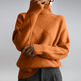 Women's Ribbed Oversized Panelled Turtleneck Sweater in Orange, on model