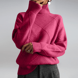 Women's Ribbed Oversized Panelled Turtleneck Sweater in Pink, on model