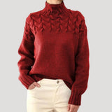 Women's Cable-Knit Twist-Knit Oversized Turtleneck Sweater in Red, on model