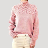 Women's Cable-Knit Twist-Knit Oversized Turtleneck Sweater in Light Pink, on model