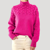 Women's Cable-Knit Twist-Knit Oversized Turtleneck Sweater in Pink, on model