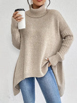 Women's Chunky-Knit Ribbed Oversized Turtleneck Sweater in Desert Khaki, on model