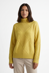 Women's Ribbed Oversized Panelled Turtleneck Sweater, on model, front view