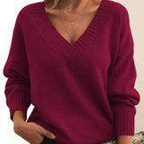 Women's V-Neck Ribbed Sweater in Red, on model